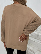 Tunika-Pullover mit Zopfmuster und geripptem Rand